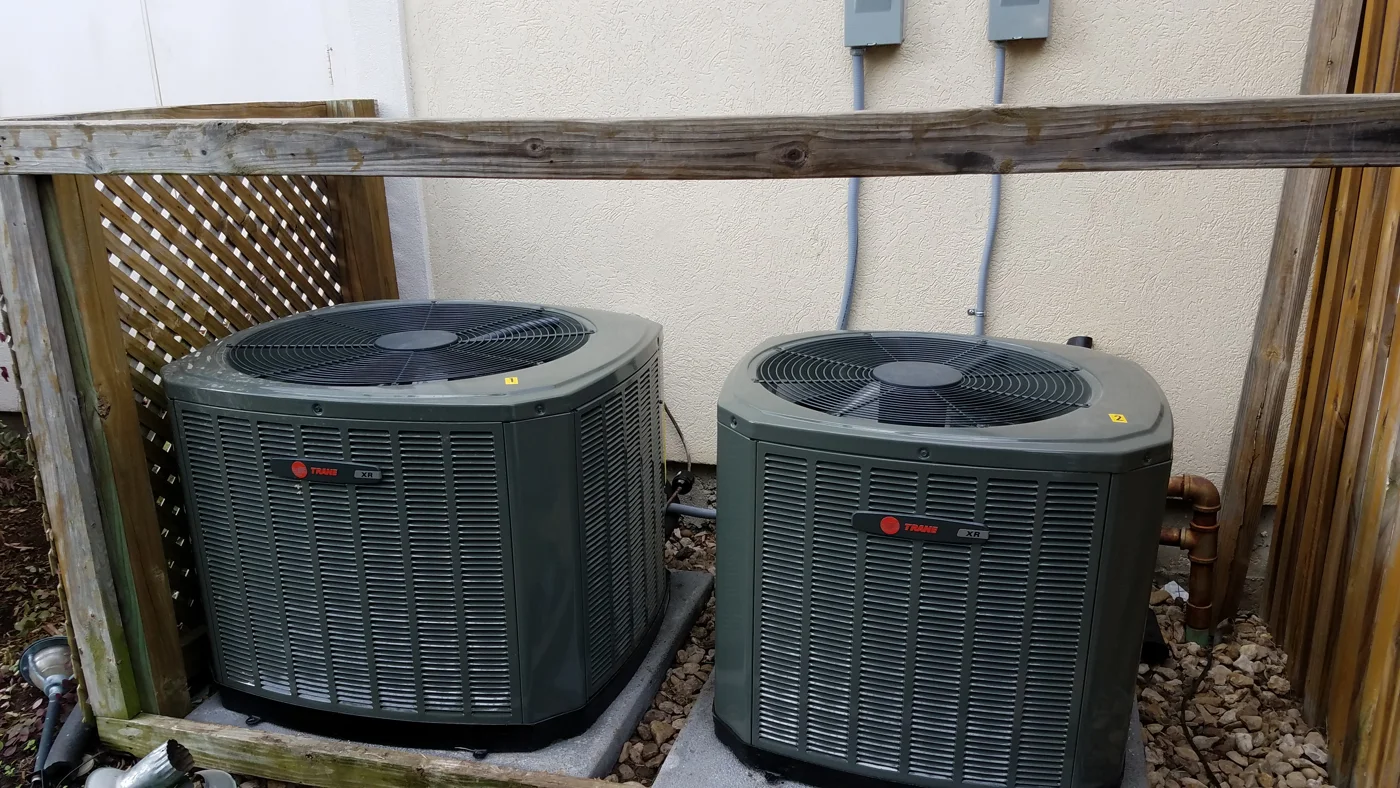 Two installed outdoor Trane air conditioning condensers